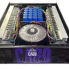 Inside view of the Ejimek Japan CA60 professional power amplifier showcasing its high-capacity toroidal transformer, large blue filter capacitors, dual heat sinks, and robust internal wiring. Engineered for reliable, high-power audio output with advanced thermal management and component layout.