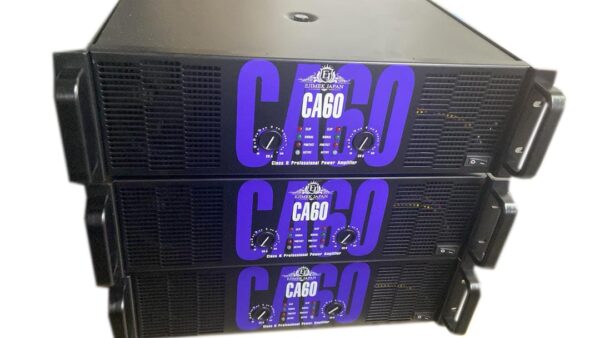 Stack of three Ejimek Japan CA60 professional power amplifiers in black and purple design. Each unit features dual-channel volume knobs, LED signal and protection indicators, efficient cooling vents, and rack-mountable construction. Designed for large-scale sound reinforcement systems and stage audio.