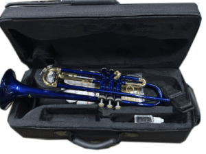 A blue and gold Ejimek Japan trumpet resting inside a black padded carrying case. The case also contains cleaning accessories and a small bottle of valve oil.