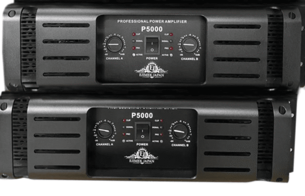 Two stacked black Ejimek Japan P5000 professional power amplifiers. Each unit has dual channel controls labeled Channel A and Channel B, with dials for volume and LED indicators for clip, signal, and protection. The central power switch is flanked by the company logo and branding below.