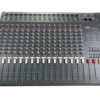 Top view of the Ejimek Japan CMX-1642 professional audio mixer featuring 16 channels. Each channel has faders, knobs for EQ and gain control, and color-coded buttons. The right side includes a master section with graphic equalizers, main mix faders, and level indicators.
